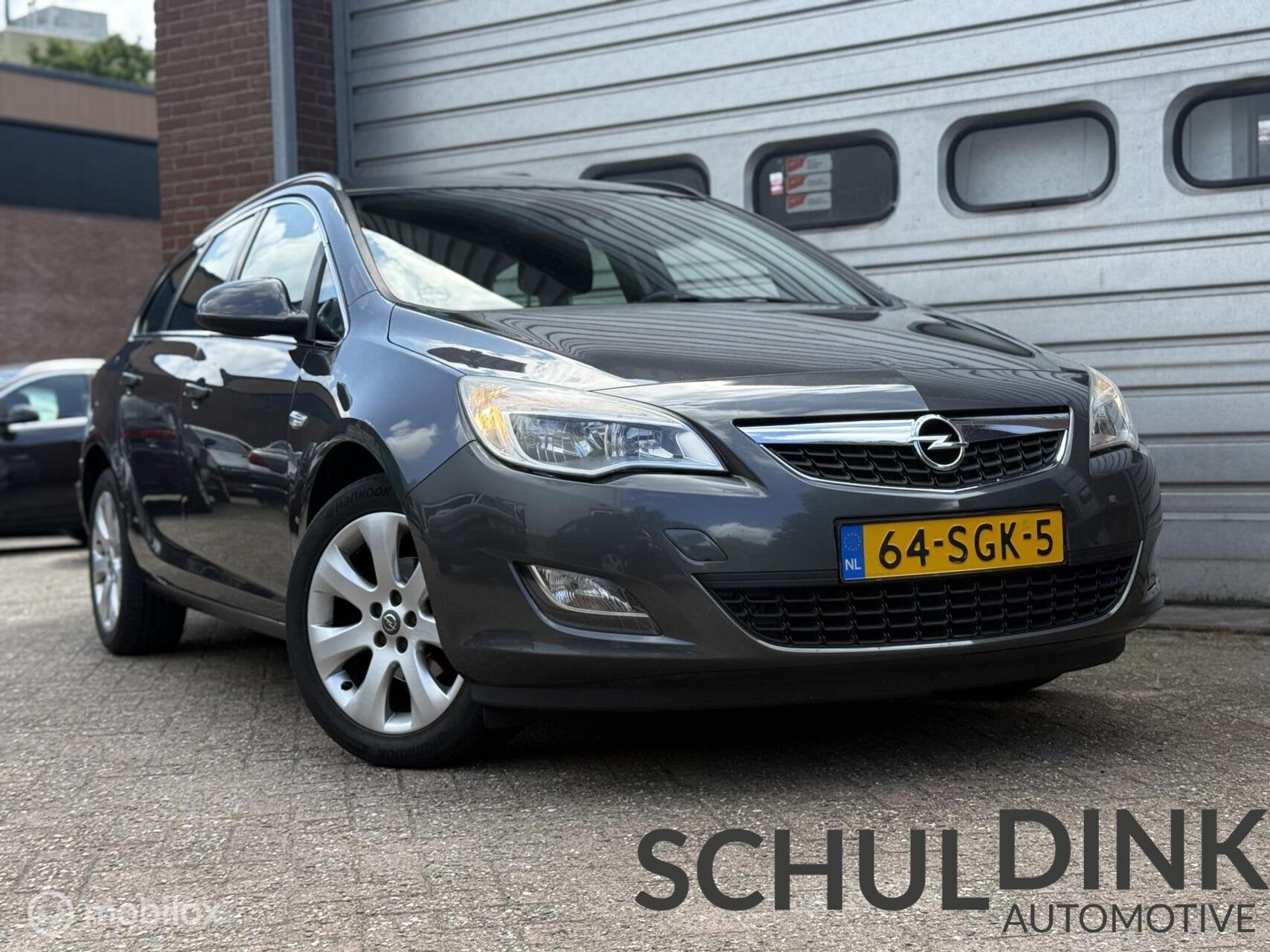 Opel Astra Sports Tourer 1.4 Turbo Edition AIRCO|TREKHAAK, Voorwielaandrijving, Euro 5, Gebruikt, 4 cilinders