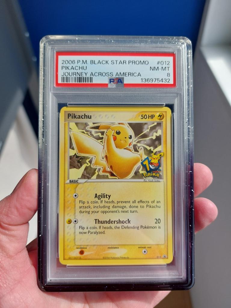 Pikachu 012 (10th anniversary) Journey Across America PSA 8, Ophalen of Verzenden, Zo goed als nieuw