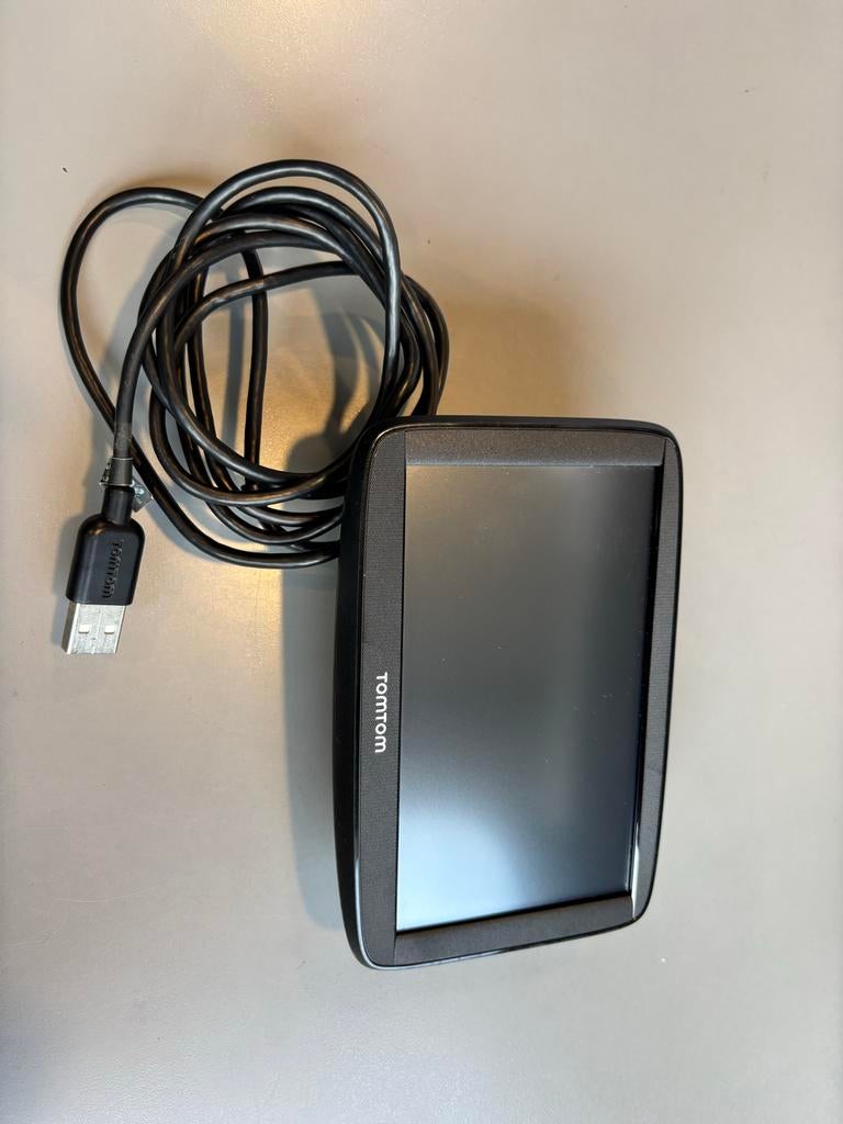 TomTom navigatiesysteem met zuignap en USB-kabel, Ophalen of Verzenden, Gebruikt