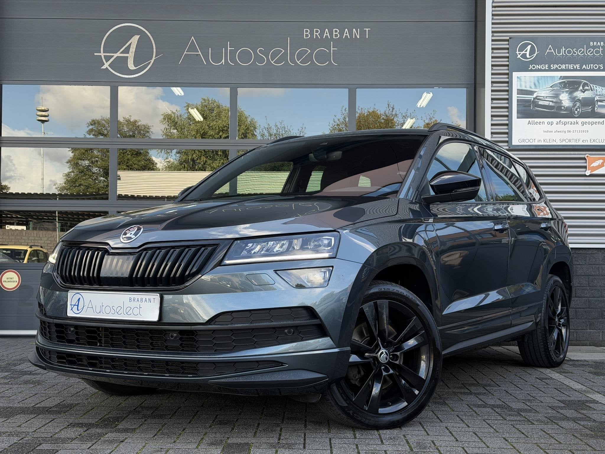 Skoda Karoq 1.5 TSI ACT Sportline Navi | Trekhaak | Dealer O, Auto's, Stof, 4 cilinders, 150 pk, Karoq
