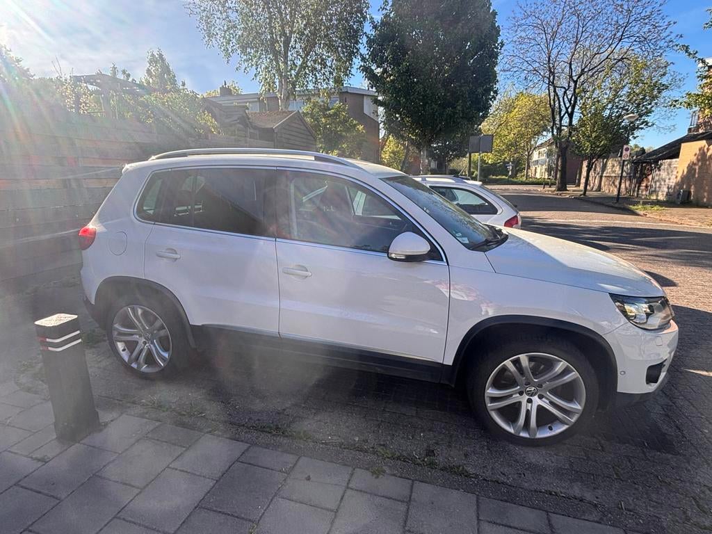 Volkswagen Tiguan 1.4 TSI 118KW BMT 2012 Wit, Voorwielaandrijving, 15 km/l, 1800 kg, Zwart