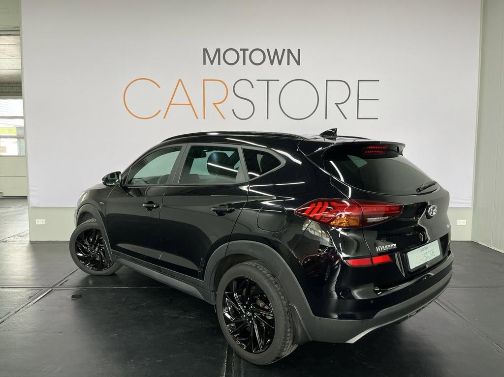 Hyundai Tucson 1.6 T-GDI N-Line Panoramadak Black Edition 19, Auto's, Hyundai, Automaat, Gebruikt, 4 cilinders, Zwart
