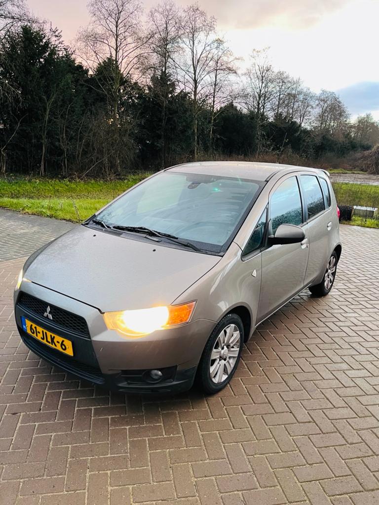 Mitsubishi Colt 1.3 5-DR 2009 Grijs, Auto's, Voorwielaandrijving, 31 €/maand, Colt, Origineel Nederlands