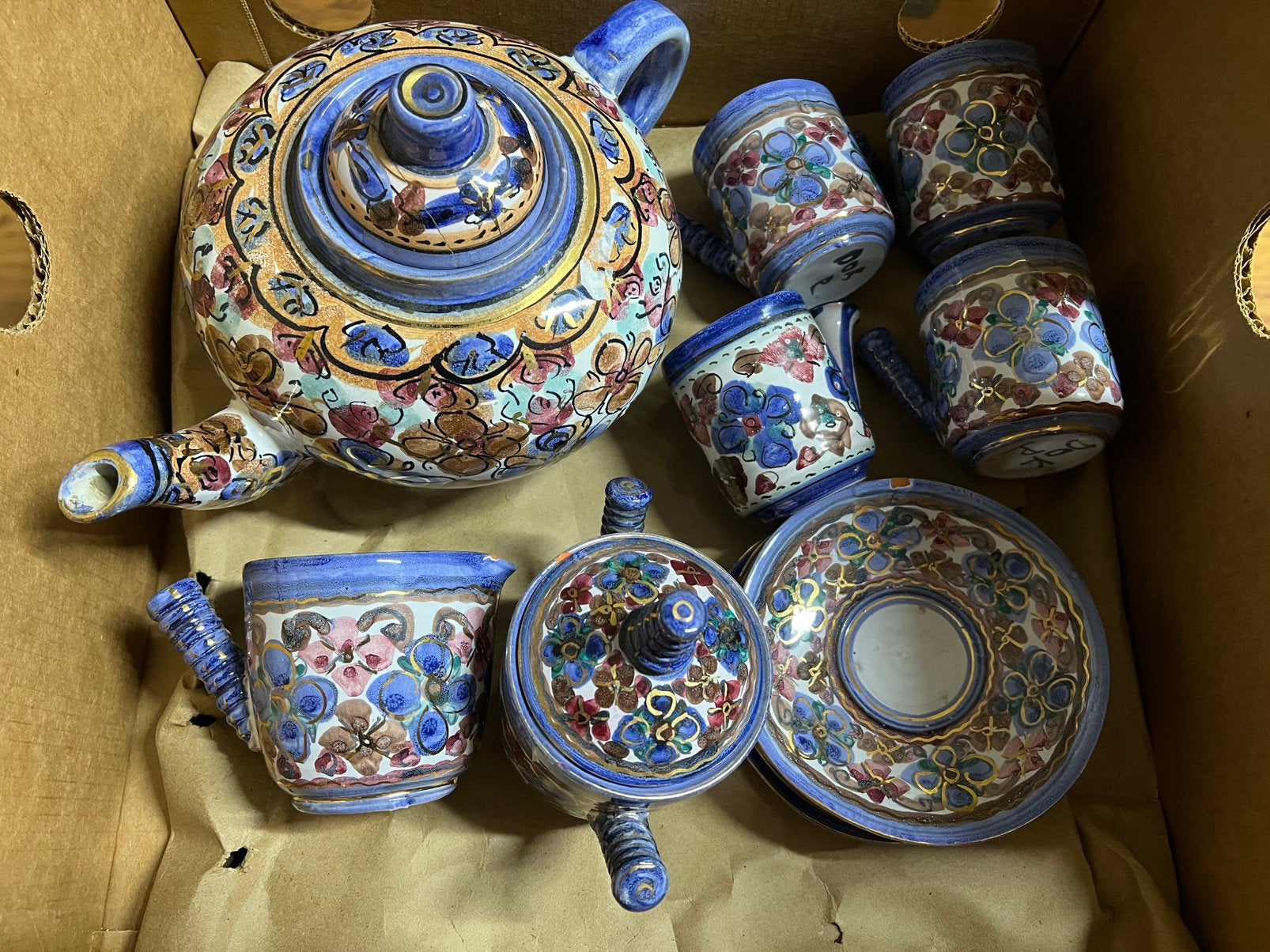 handgeschilderd theeservies, Ophalen