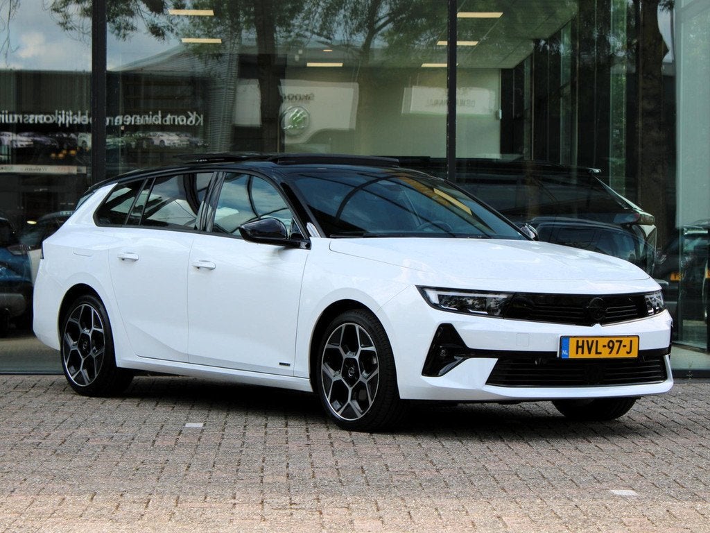 Opel Astra Sports Tourer 1.2 Turbo Ultimate | Navi / Panoram, Automaat, Gebruikt, 1199 cc, Lichtsensor