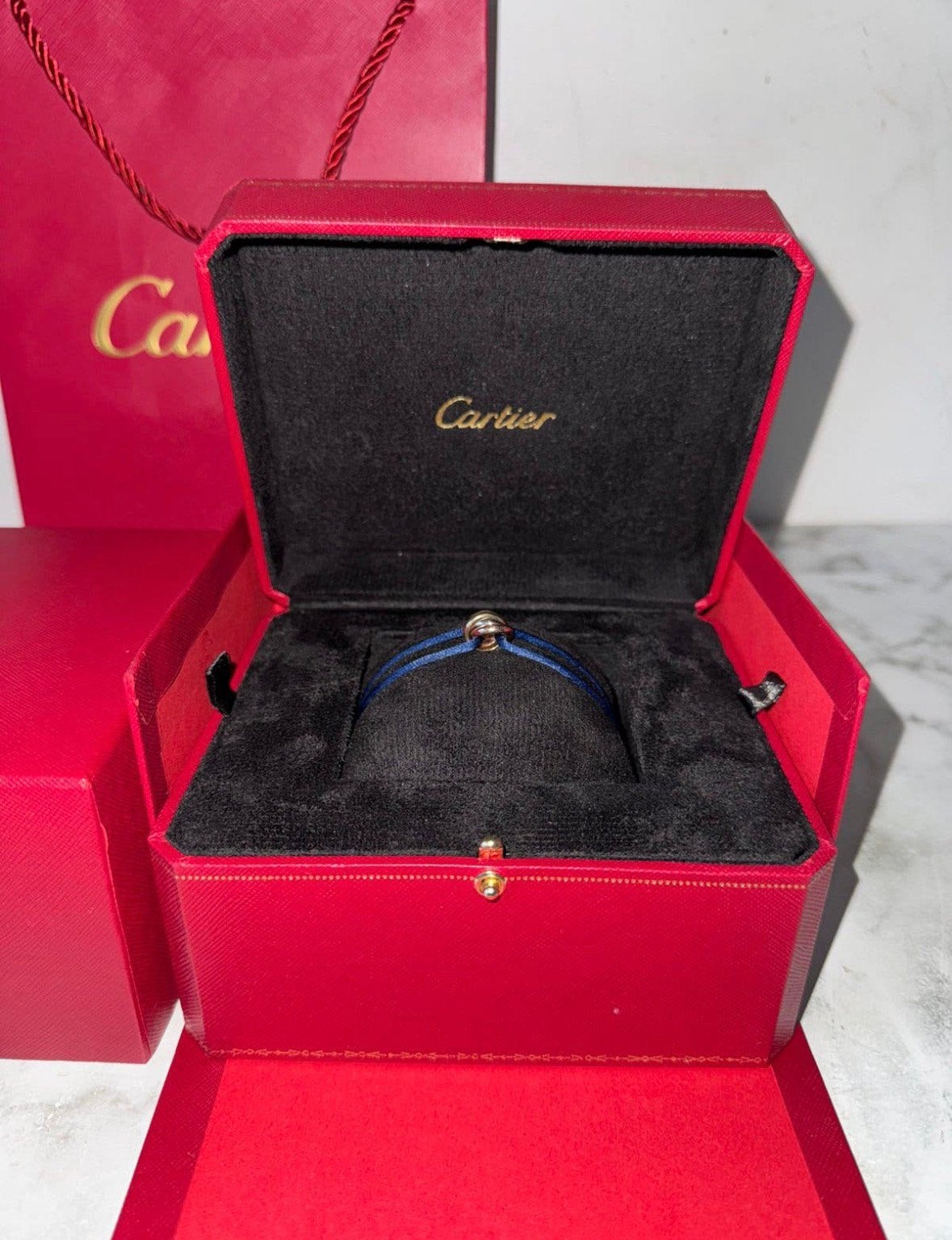 Cartier trinity armbanden, Ophalen of Verzenden, Zo goed als nieuw, Zwart, Goud