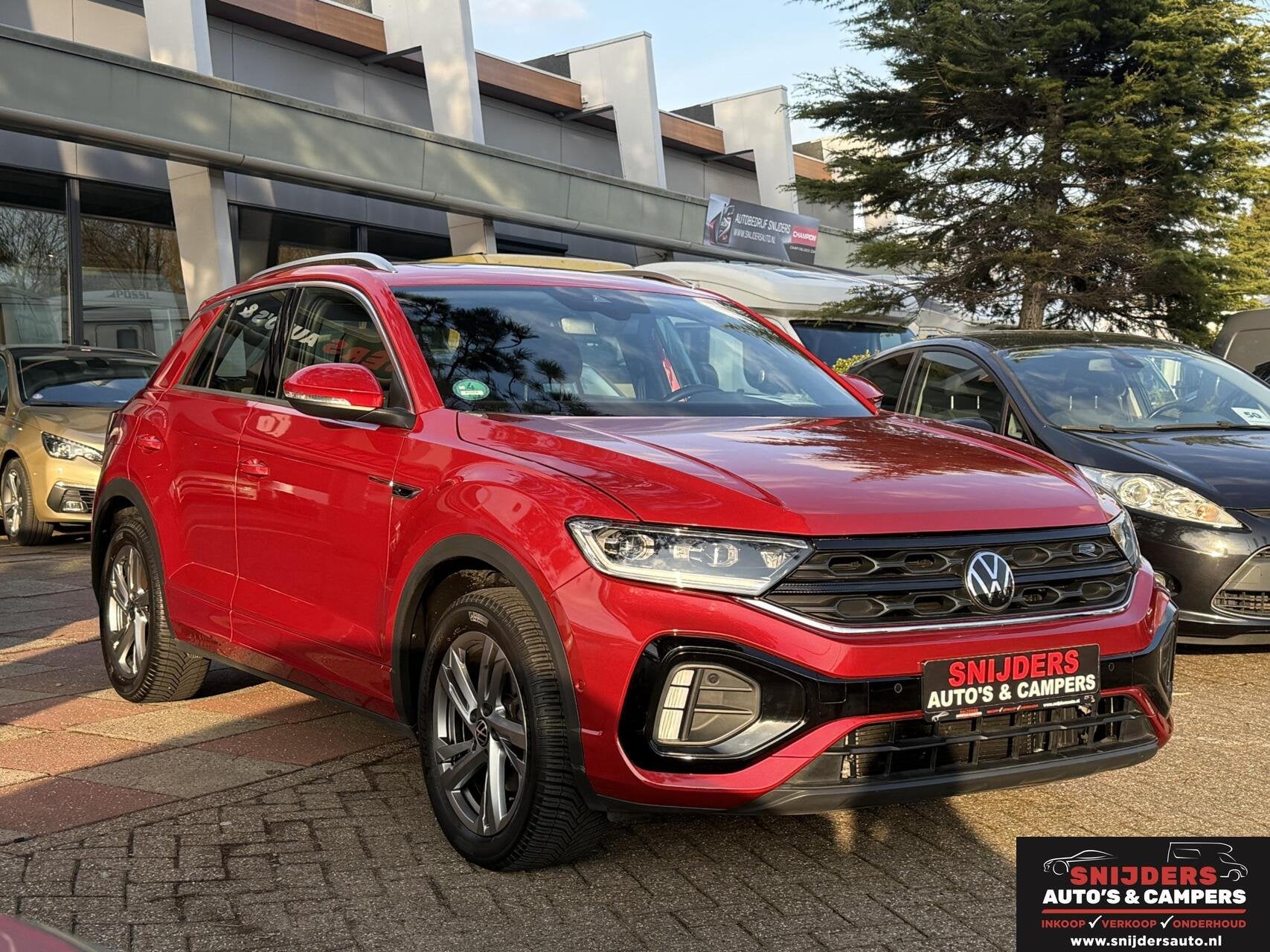 Volkswagen T-Roc 1.5 TSI Sport Business R panoramadak, Auto's, Volkswagen, Stof, Zwart, 4 cilinders, 16 km/l