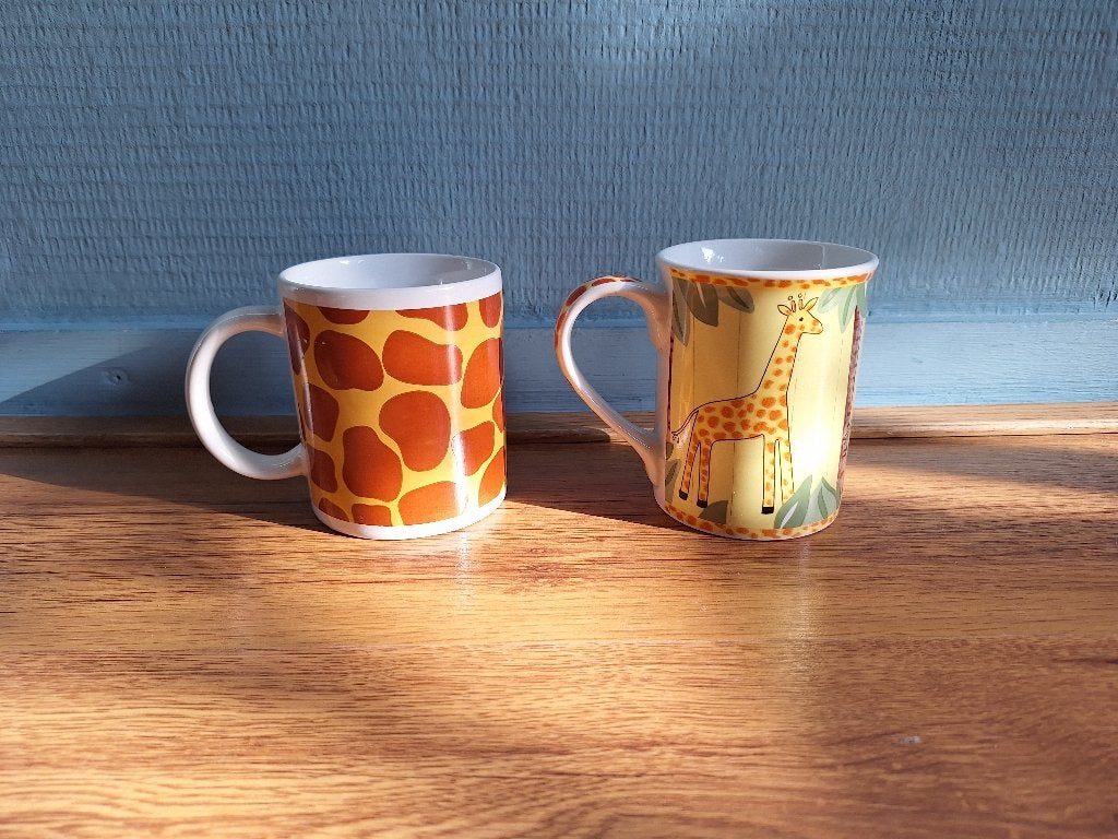 Set van 2 Giraffe bekers, Keramiek, Ophalen of Verzenden, Zo goed als nieuw, Overige stijlen