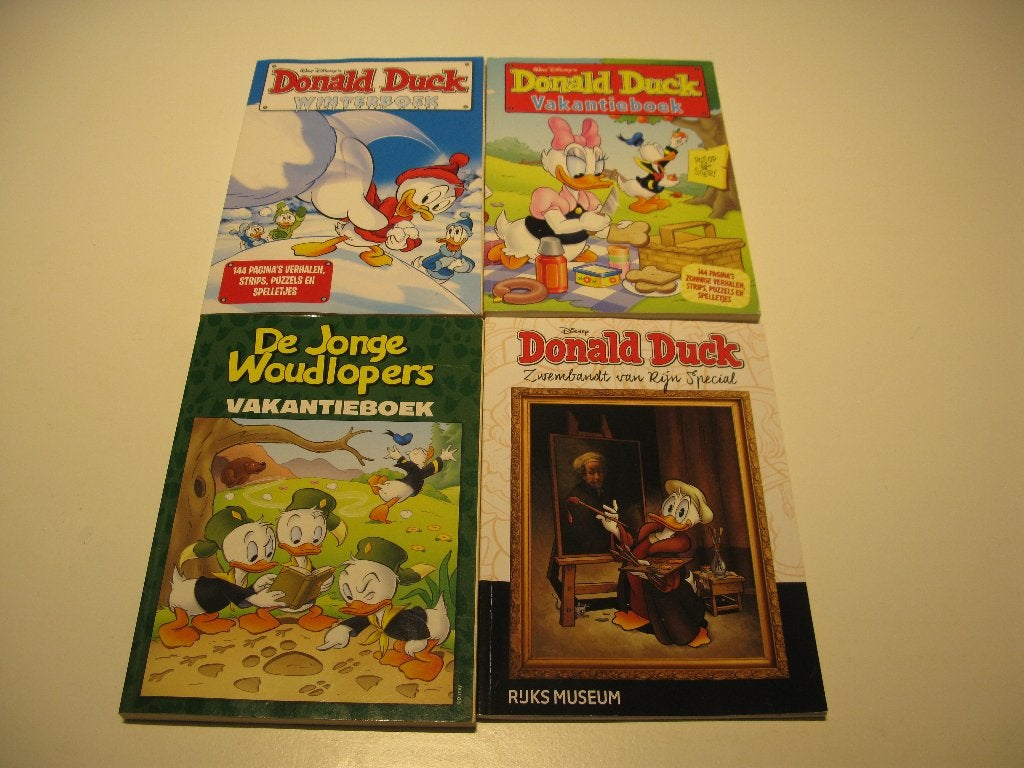 Donald Duck boeken 4x, groot formaat, Boeken, Gelezen, Ophalen of Verzenden, Disney Donald Duck, Meerdere stripboeken