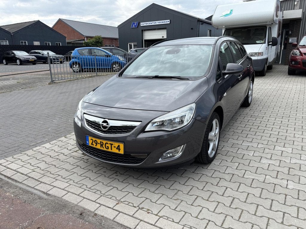 Opel Astra Sports Tourer 1.4 Turbo Airco Cruise Trekhaak, Voorwielaandrijving, Euro 5, Stof, Gebruikt