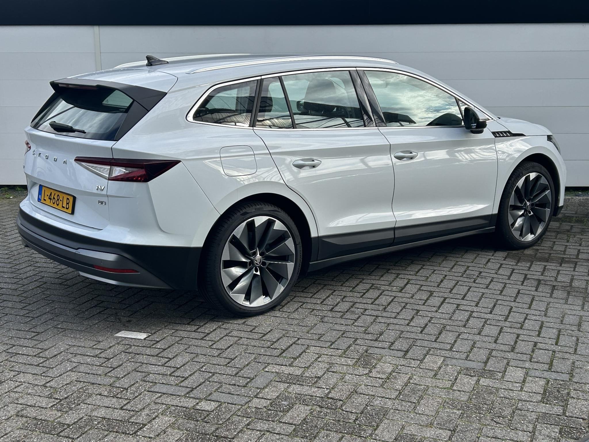 Skoda Enyaq iV 80 First Edition | 93% SoH | Trekhaak | Leder, Auto's, Achterwielaandrijving, Gebruikt, Huisgarantie, Leder en Stof