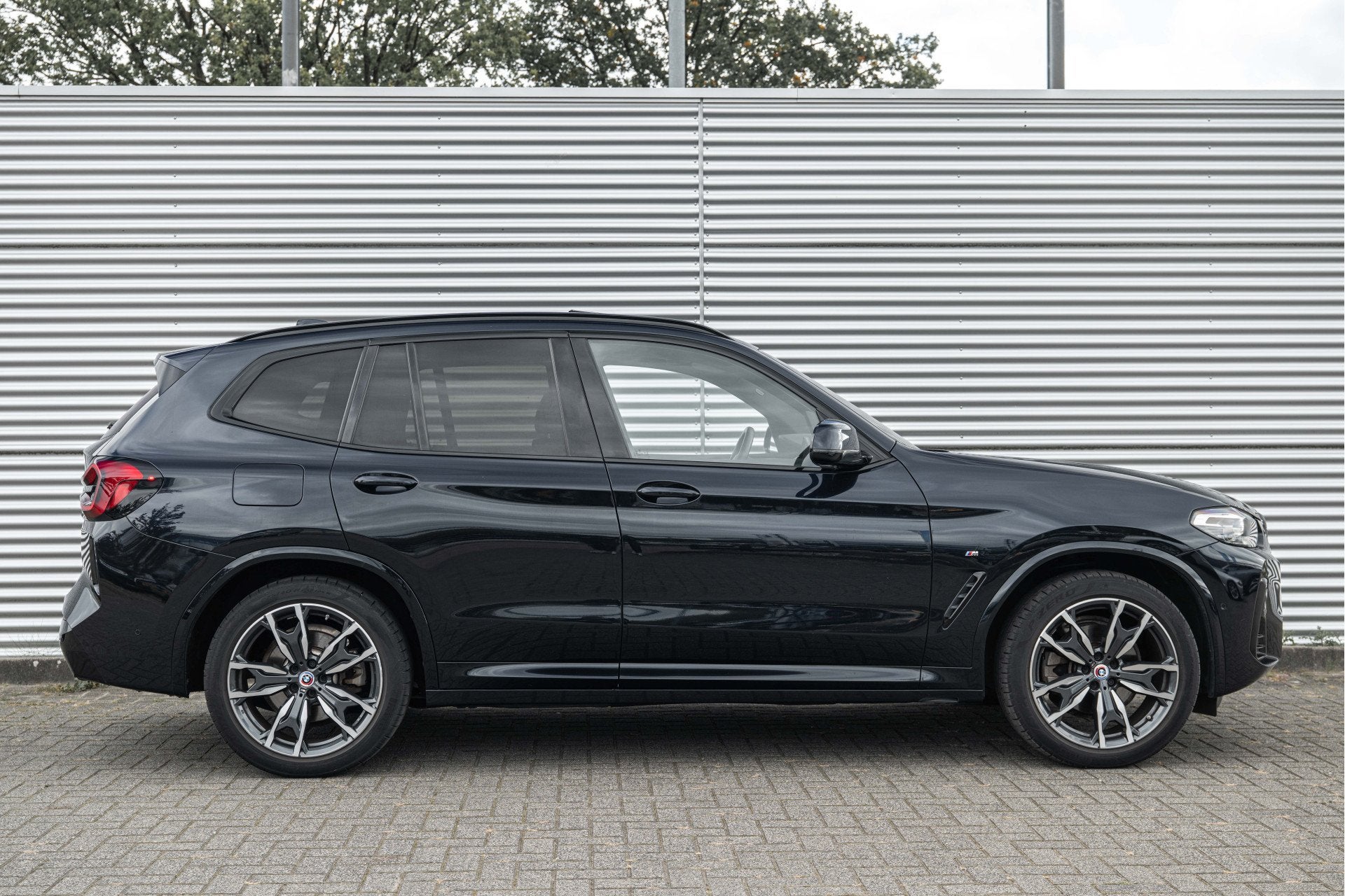 BMW X3 xDrive20i High Executive M Sport Automaat / Panoramad, Auto's, Gebruikt, 4 cilinders, Met garantie (alle), Zwart