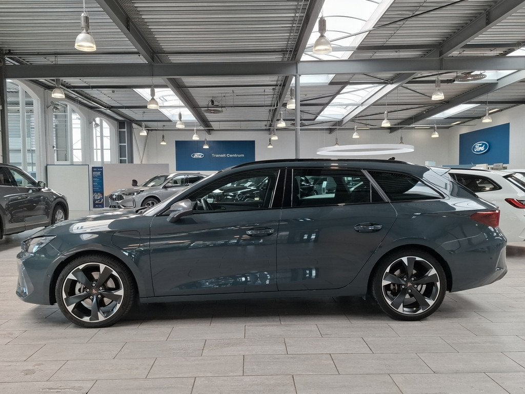 CUPRA Leon Sportstourer 1.5 TSI e-Hybrid 204pk Business | St, Auto's, Cupra, 12 maanden, 4 cilinders, Leder en Stof, Plug-in hybride