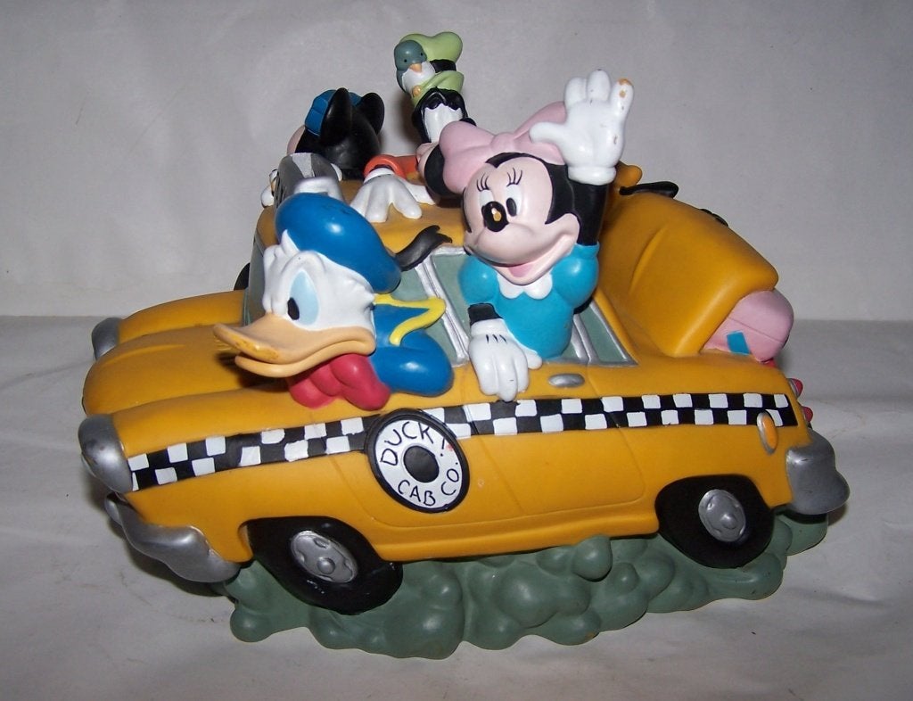 Disney Taxi spaarpot m. Mickey, Minnie, Donald, Goofy,,Pluto, Ophalen of Verzenden, Mickey Mouse, Gebruikt, Beeldje of Figuurtje