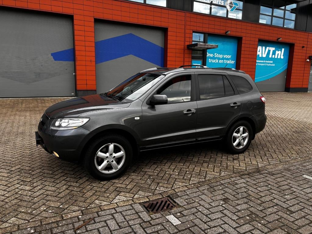 Hyundai Santa Fe 2.7 2WD 2006 Grijs, Auto's, Hyundai, Voorwielaandrijving, Santa Fe, 2000 kg, Metallic lak