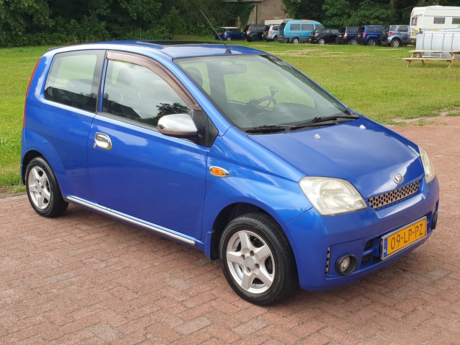 Daihatsu Cuore 1.0 3D 2004 ✅ Nieuwe APK!!, Auto's, Stof, 600 kg, Zwart, Cuore