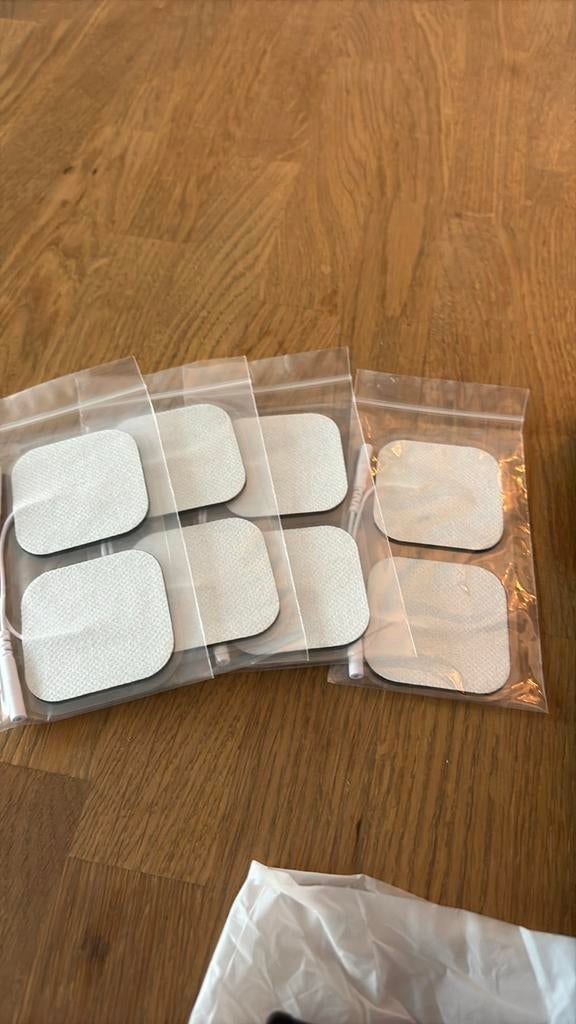Nieuw Oplaadbaar TENS Apparaat met 8 Pads en Opbergdoos, Ophalen of Verzenden, Nieuw, Overige typen
