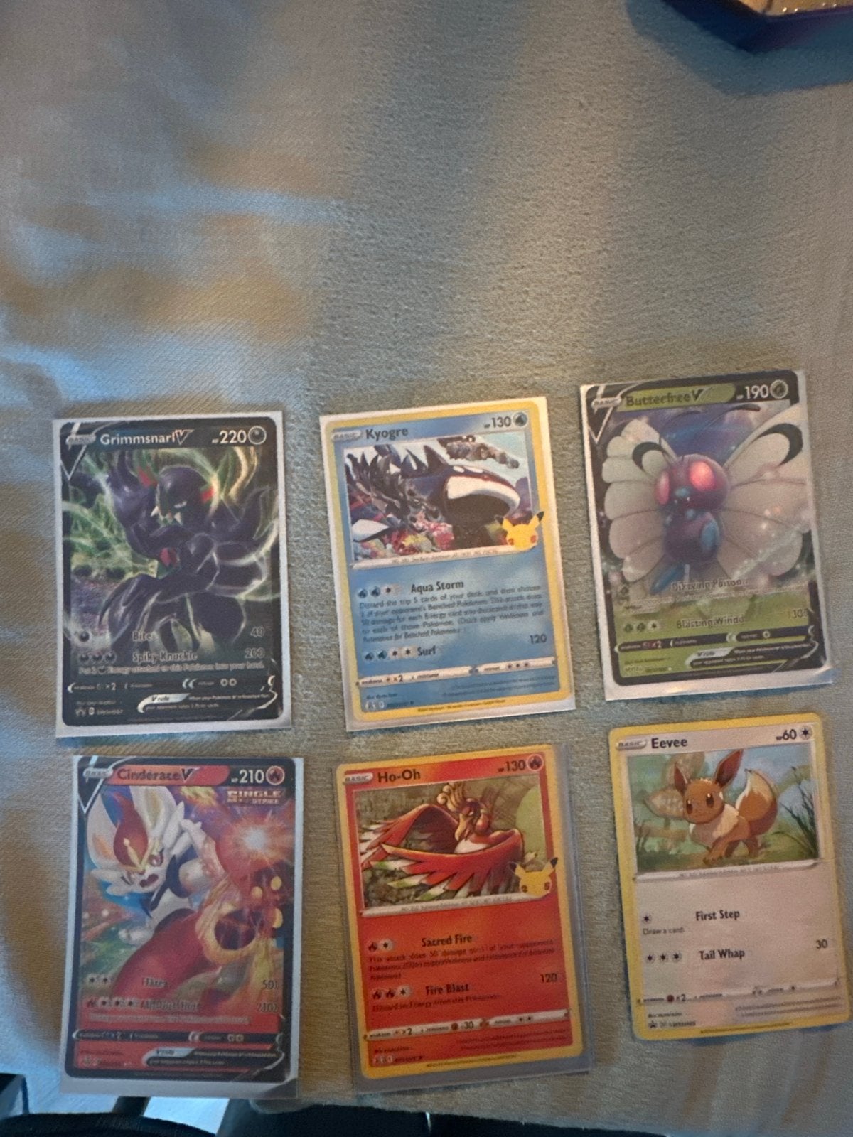Pokémon Kaarten Collectie: Grimmsnarl V, Kyogre, Butterfree, Ophalen of Verzenden, Zo goed als nieuw, Meerdere kaarten