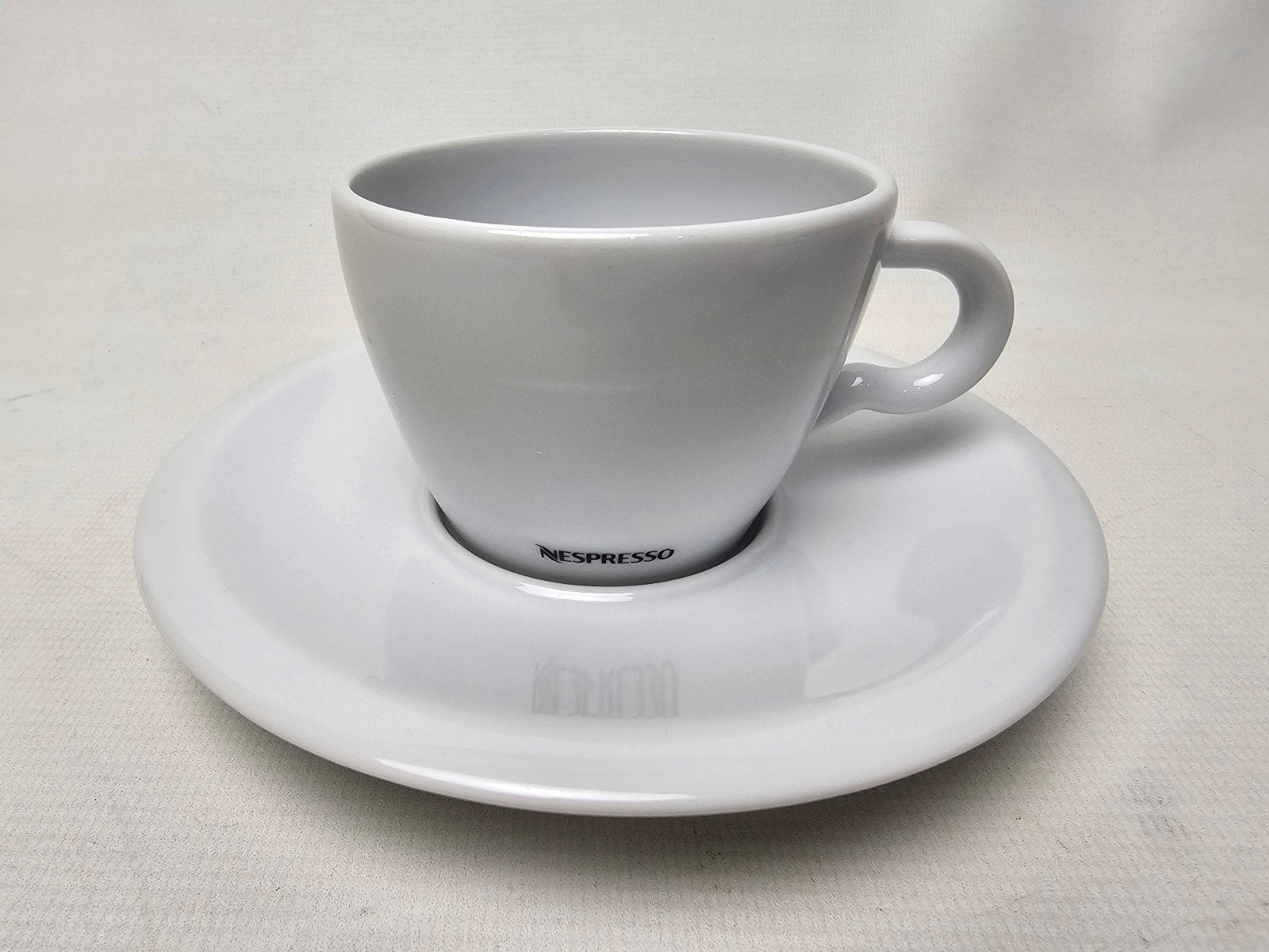 # Nespresso cappuccino kop en schotel, Gebruikt, Overige merken, Keramiek, Ophalen of Verzenden