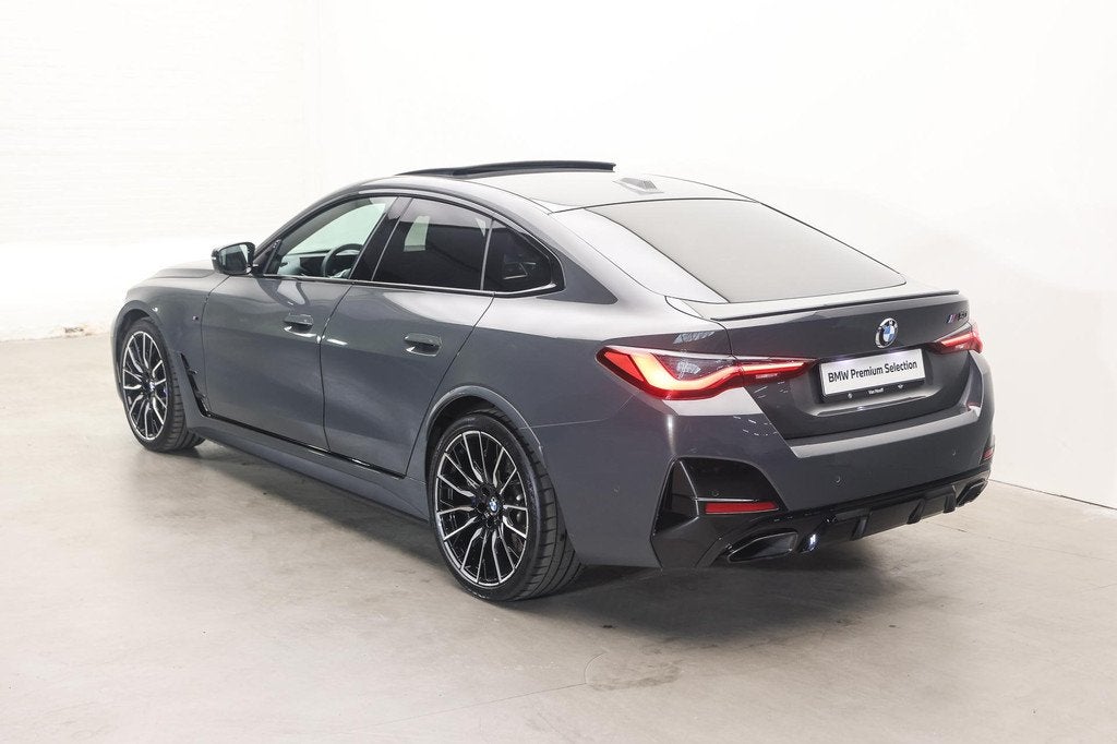BMW i4 M50 High Executive / Schuif-kanteldak / Laserlight /, Auto's, BMW, Gebruikt, 520 km, Laserlicht, 2190 kg