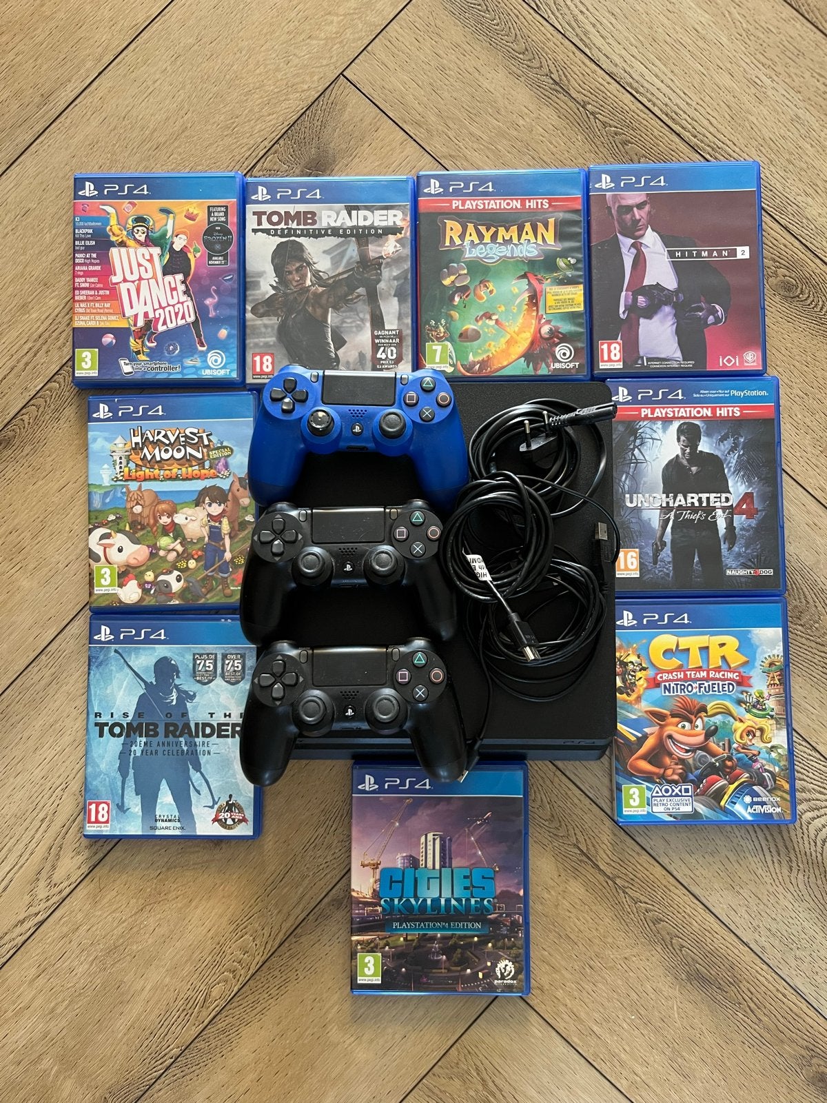 PlayStation 4 Slim met 3 controllers en 8 games, Spelcomputers en Games, Ophalen of Verzenden, Met 3 controllers of meer, Slim