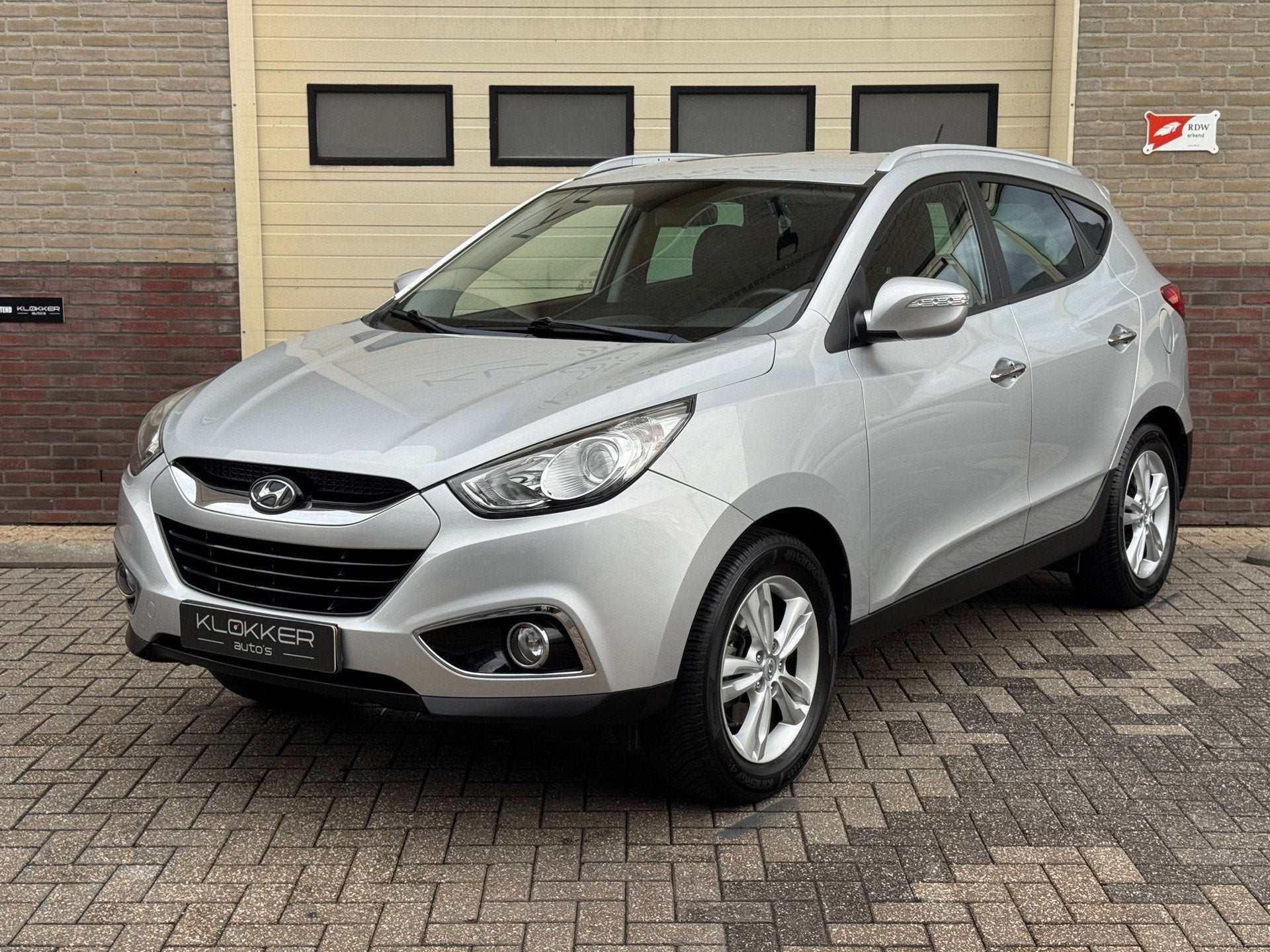 Hyundai Ix35 2.0i Style Automaat|Airco|Cruise|Climate|2E EIG, Auto's, Gebruikt, Zwart, 4 cilinders, Leder en Stof