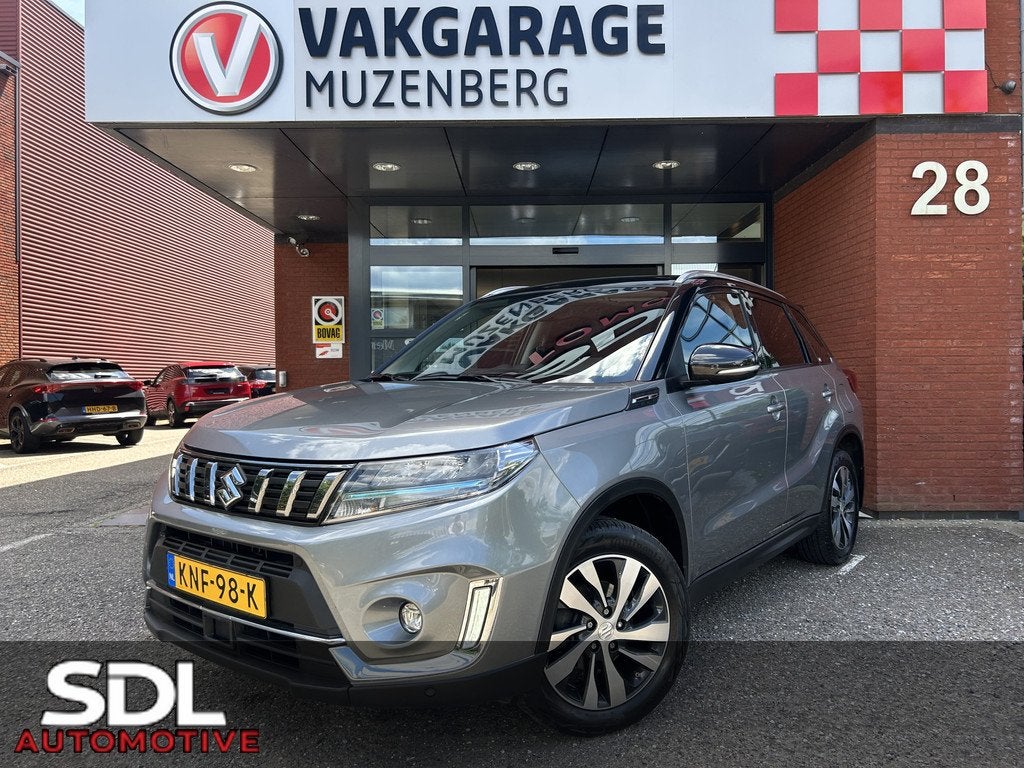 Suzuki Vitara 1.5 Hybrid Style AllGrip // SCHUIF-KANTELDAK /, Auto's, Suzuki, Automaat, Gebruikt, Zwart, 4 cilinders