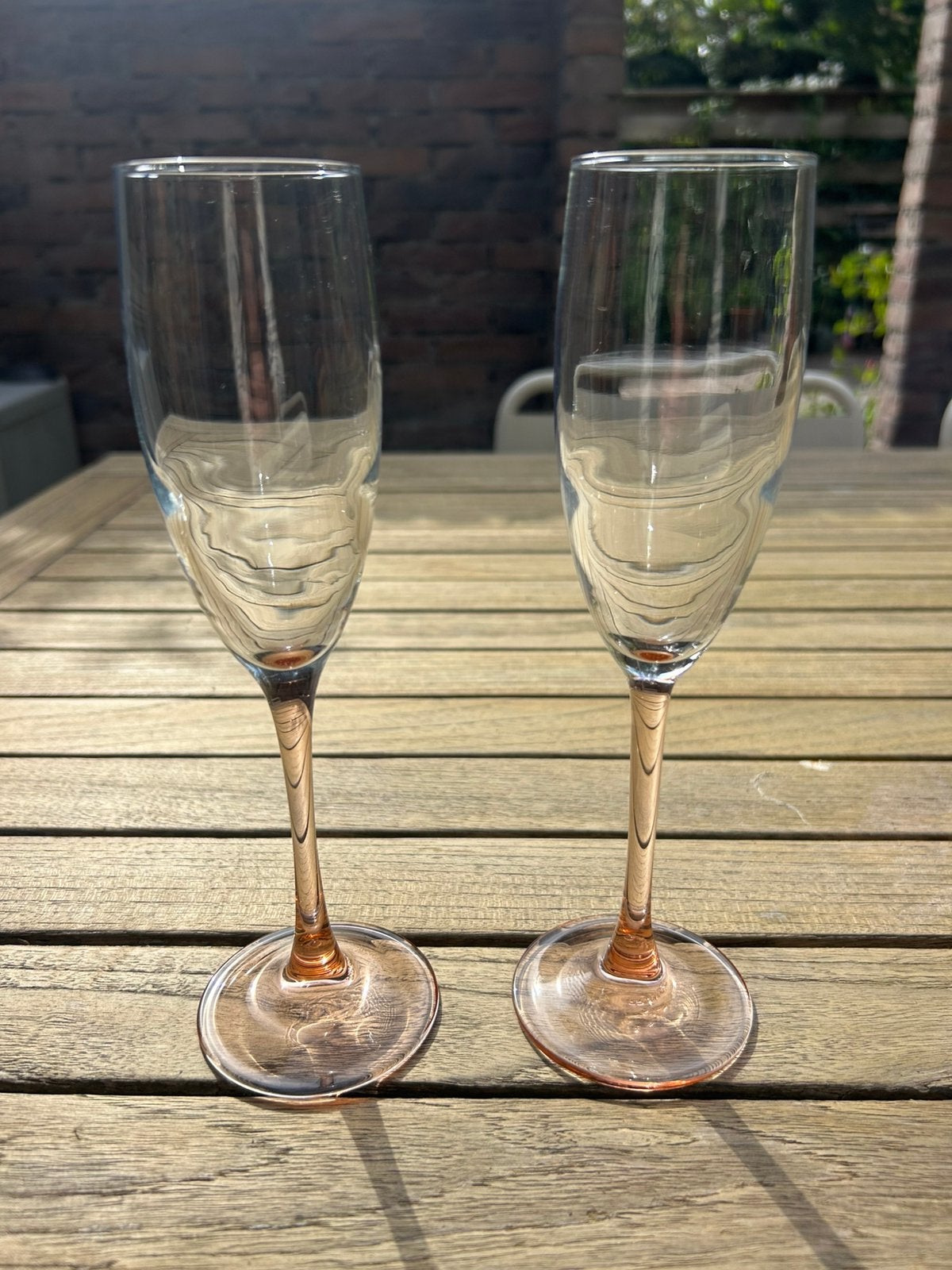 8 x Elegant champagneglas met roze voet, Ophalen of Verzenden