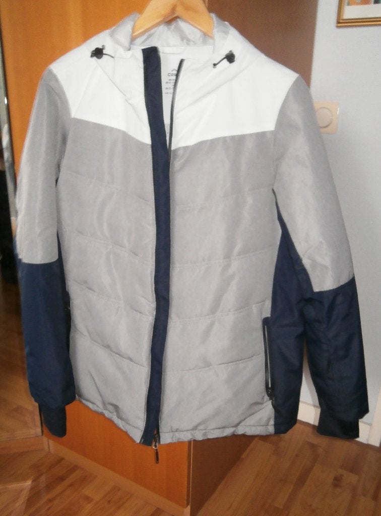 Mooi ski-jack mt L 42 Crivit grijs/blauw/wit mt capuchon nw, Kleding | Dames, Maat 42/44 (L), Nieuw, Ophalen of Verzenden, Crivit