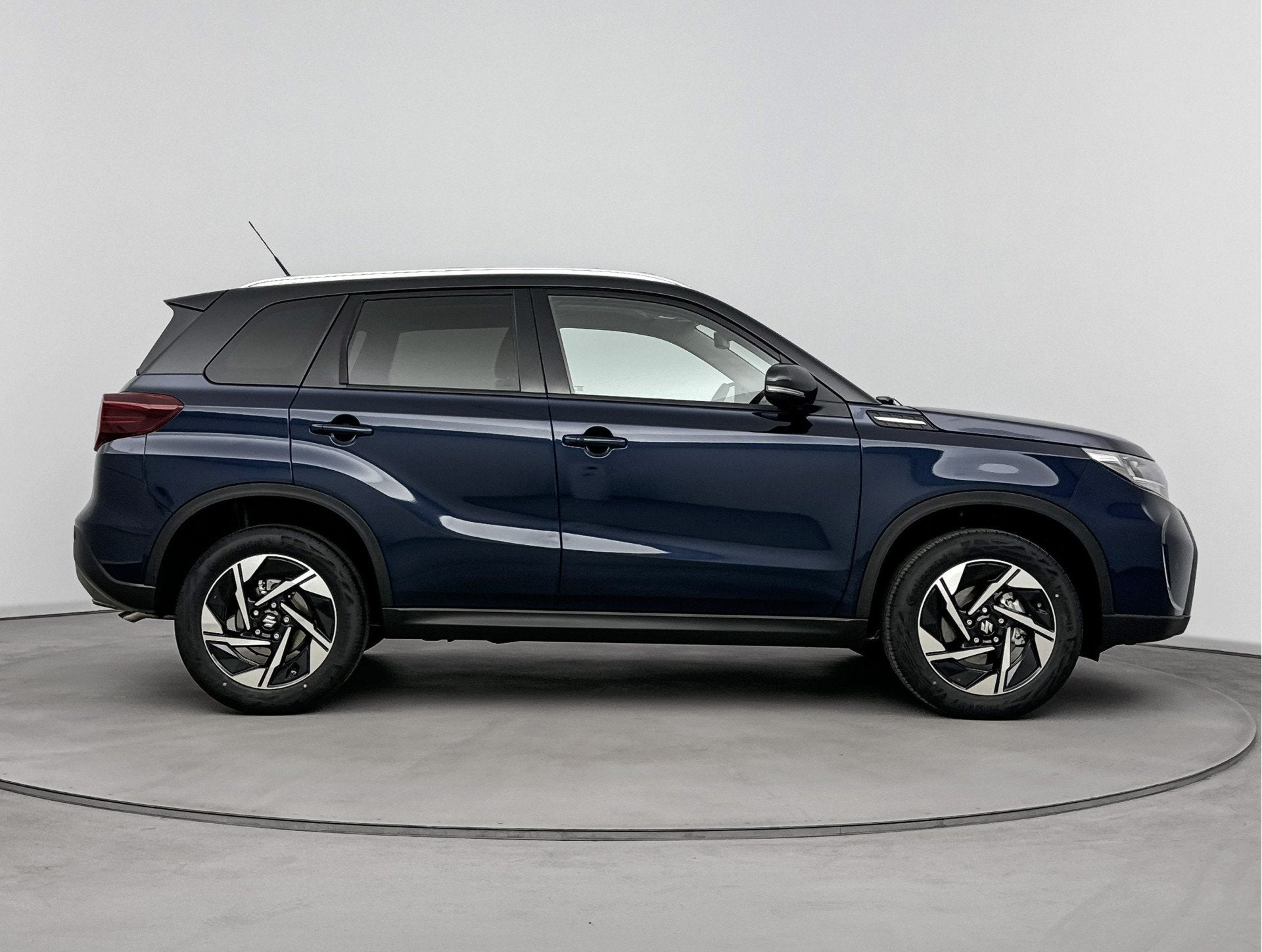 Suzuki Vitara 1.4 Boosterjet Style Smart Hybrid *NIEUW*, Auto's, Voorwielaandrijving, 12 maanden, 4 cilinders, Blauw