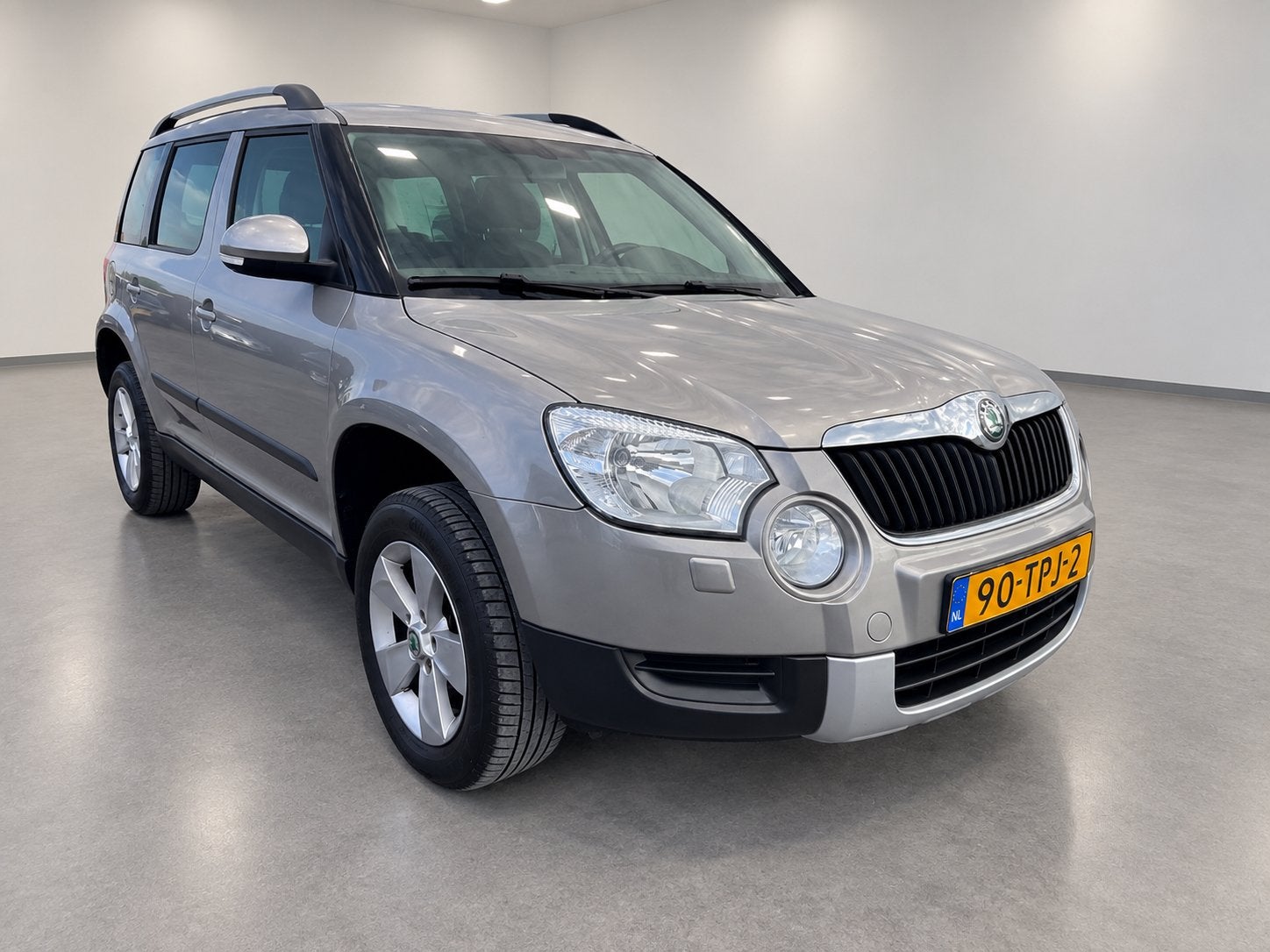 Skoda Yeti 1.2 TSI Automaat NAP 1e Eigenaar Navi Touchscreen, Auto's, Euro 5, 4 cilinders, Beige, Origineel Nederlands