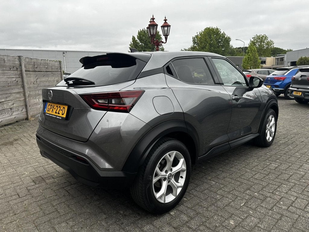 Nissan Juke 1.0 DIG-T Acenta Navigatie | Camera, Auto's, Nissan, Voorwielaandrijving, Stof, Met garantie (alle), Bedrijf
