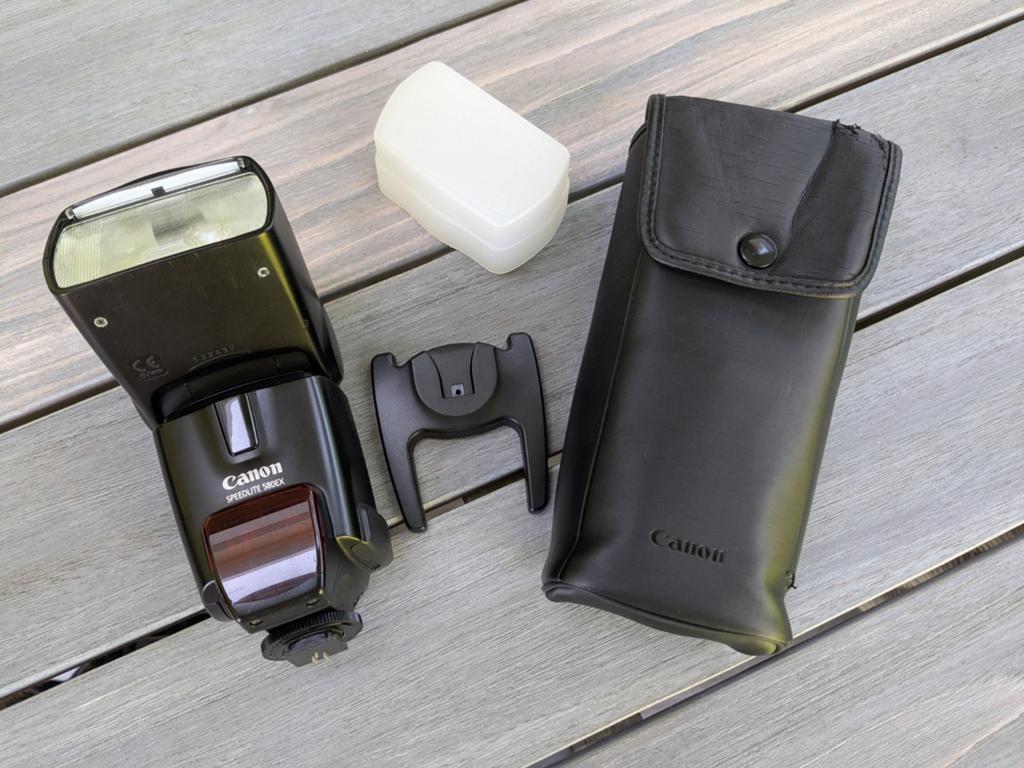 Canon Speedlite 580EX flitser met accessoires, Ophalen of Verzenden, Gebruikt, Canon, Kantelbaar