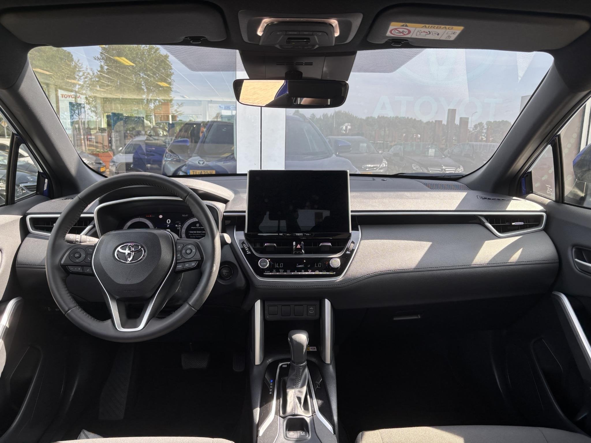 Toyota Corolla Cross Hybrid 140 Dynamic | All season banden, Auto's, Toyota, Stof, Gebruikt, 4 cilinders, Blauw