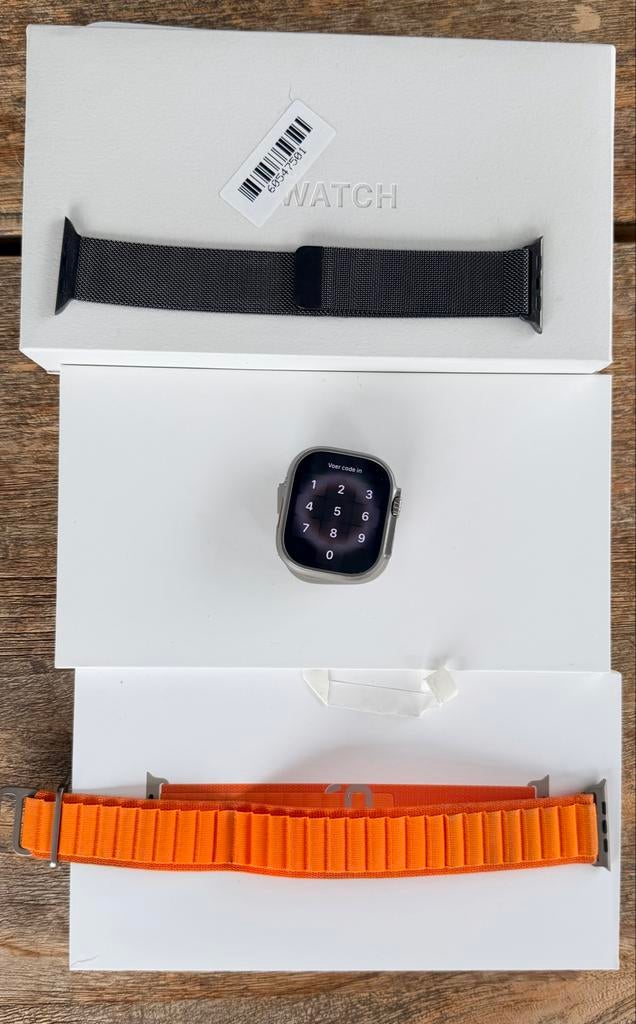 Apple Watch Ultra Orange Loop + Apple RVS band 100 krasvrij, Ophalen, Bandje, Zo goed als nieuw, Apple
