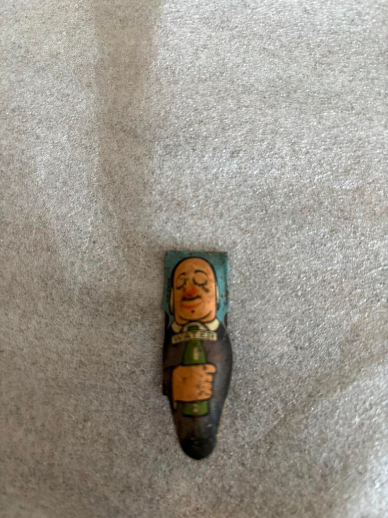 Blikken clicker oud man met fles water, Antiek en Kunst, Antiek | Speelgoed, Ophalen of Verzenden