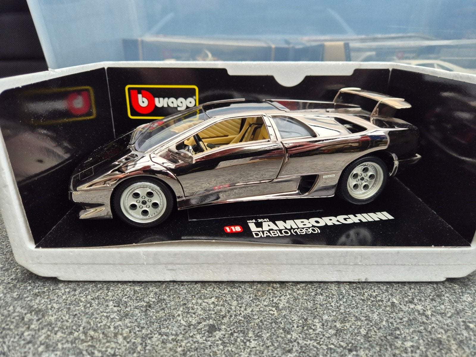 Bburago Lamborghini Diablo chroom Bijenkorf editie, Hobby en Vrije tijd, Ophalen of Verzenden, Zo goed als nieuw, Bburago