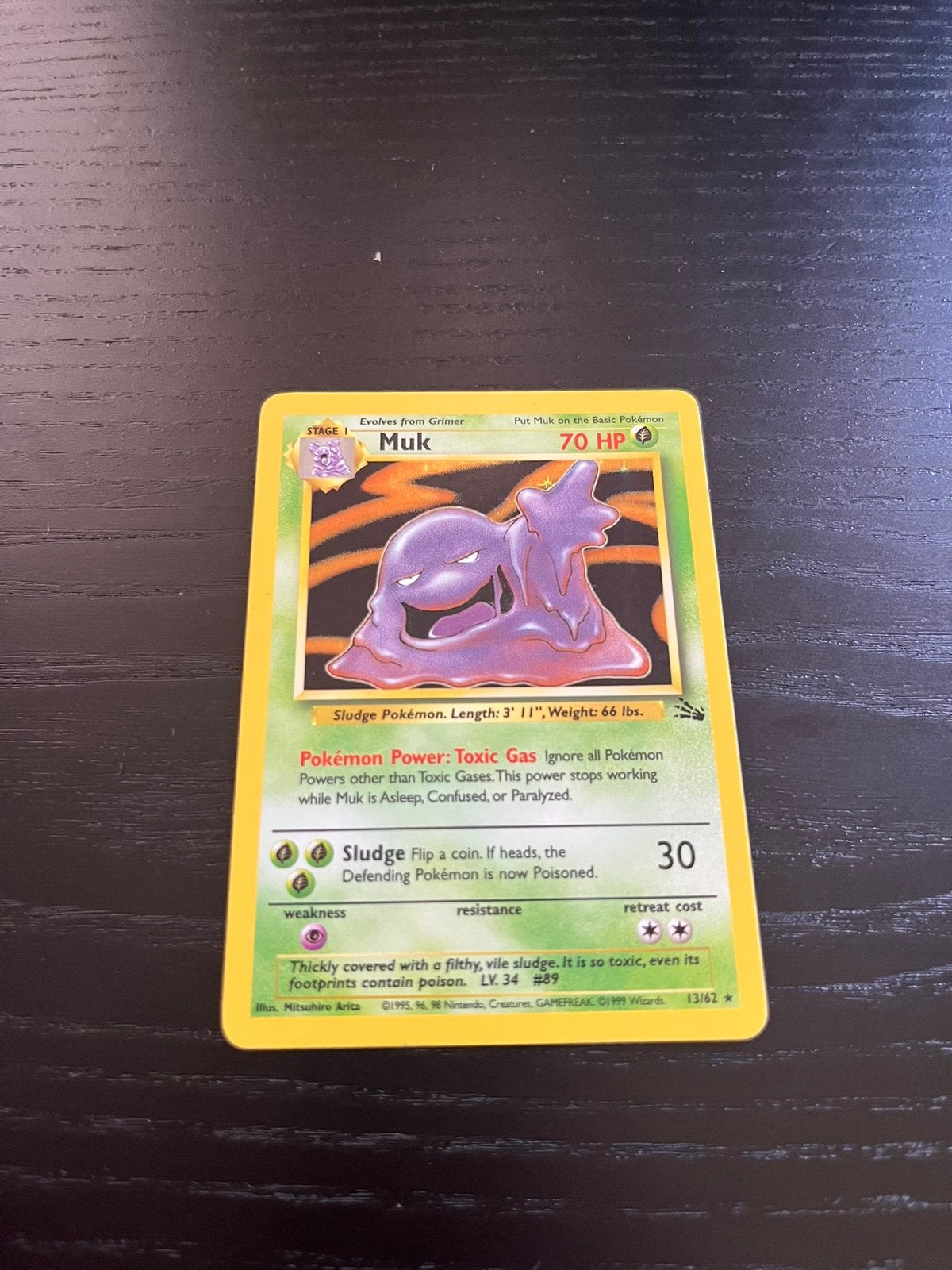 Muk holo 13/62 - Fossil set, Ophalen of Verzenden, Zo goed als nieuw, Losse kaart, Foil
