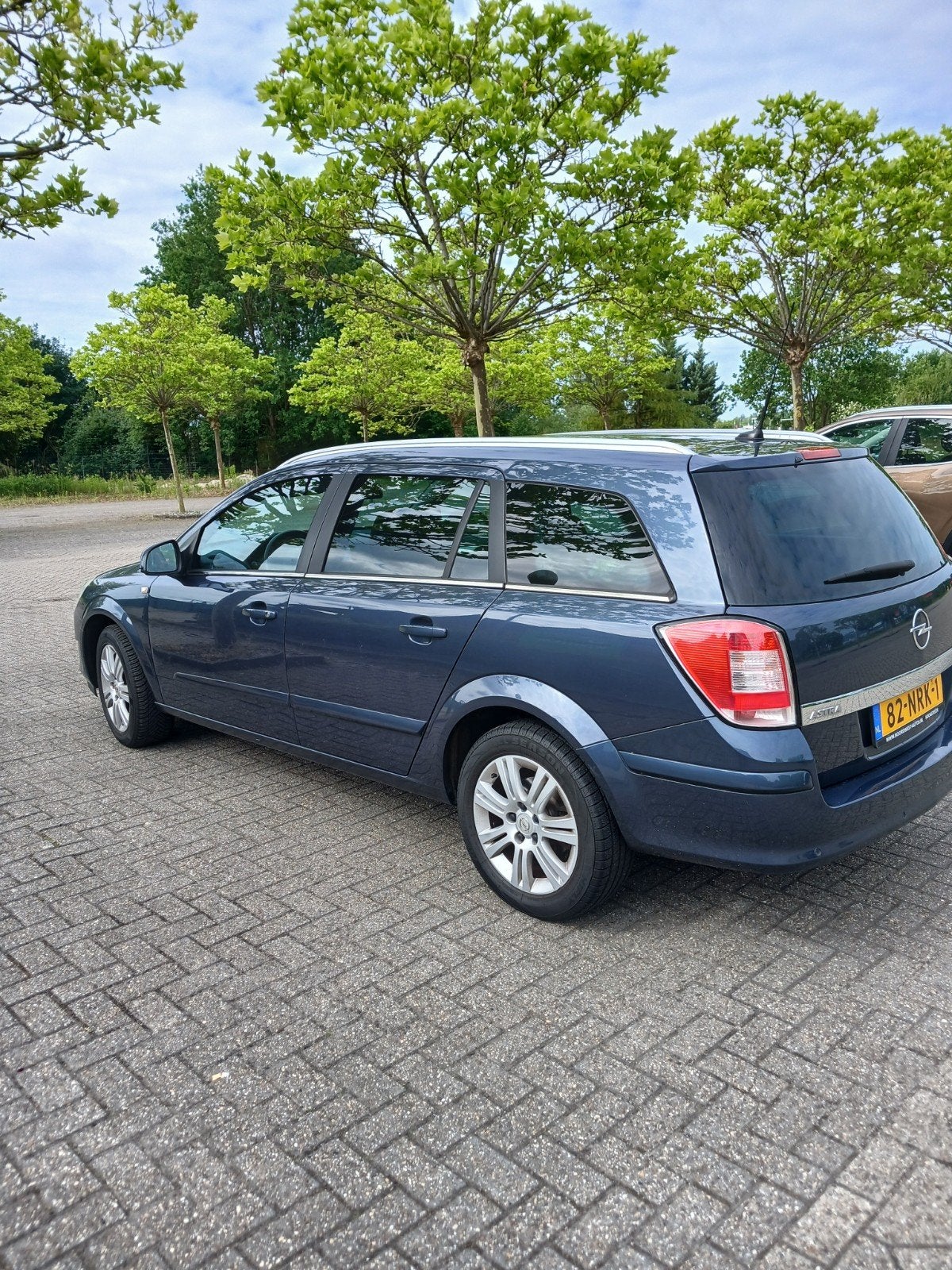 Opel Astra 1.6 16V 85KW St.wgn. 2010 Blauw nieuwe distr riem, Voorwielaandrijving, 15 km/l, Blauw, Origineel Nederlands
