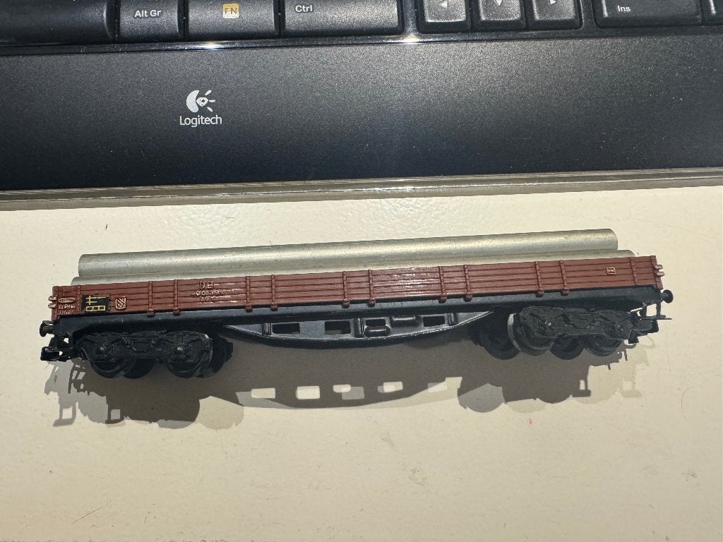 Märklin 4914 Lageboord wagon met buizen, Wisselstroom, Wagon, Ophalen of Verzenden, Zo goed als nieuw