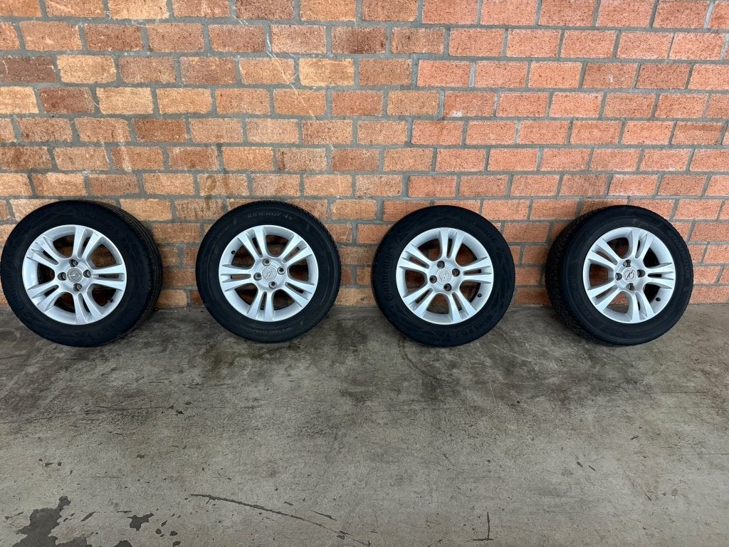 Opel Corsa lichtmetalen velgenset 185/65R16 Hankook, Conti, Auto-onderdelen, Ophalen, Gebruikt, 15 inch, Banden en Velgen