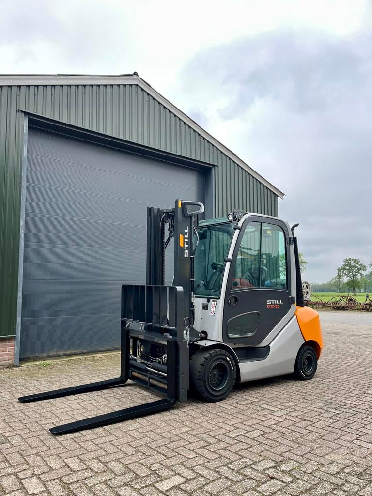 Still RX 70-35 LPG - NIEUWSTAAT - volle opties - TOP !!!!!!, Zakelijke goederen, Machines en Bouw | Heftrucks en Intern transport