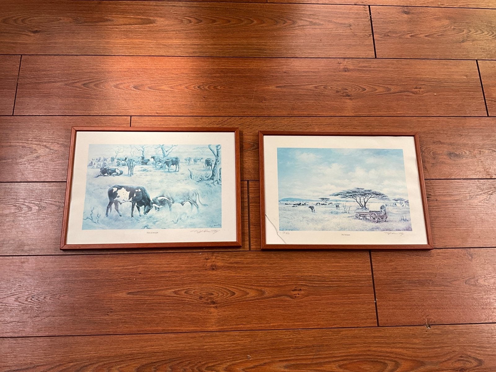 Twee ingelijste prints van Jeff Huntly - Afrikaanse taferele, Antiek en Kunst, Kunst | Tekeningen en Foto's, Ophalen of Verzenden