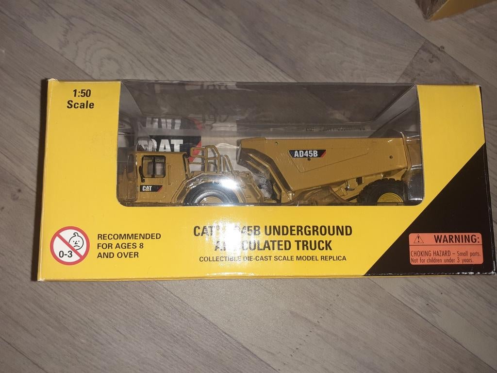 Norscott CAT dumper AD45B, Hobby en Vrije tijd, Modelauto's | 1:50, Ophalen of Verzenden, Zo goed als nieuw, Bus of Vrachtwagen