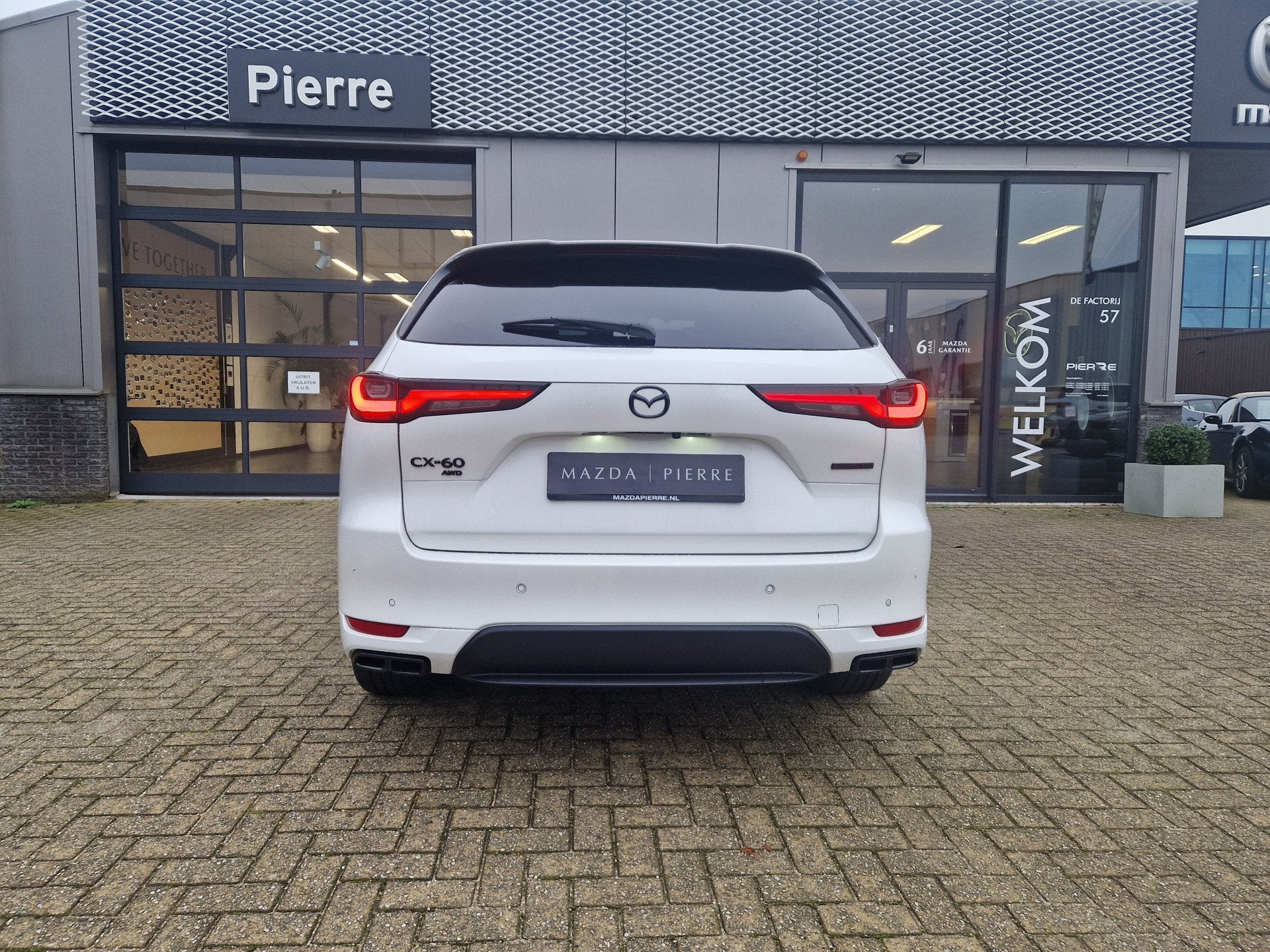 Mazda CX-60 2.5 e-SkyActiv PHEV Homura | NAVI | ACHTERUITRIJ, Auto's, Mazda, Automaat, Dealer onderhouden, 136 pk, Gebruikt