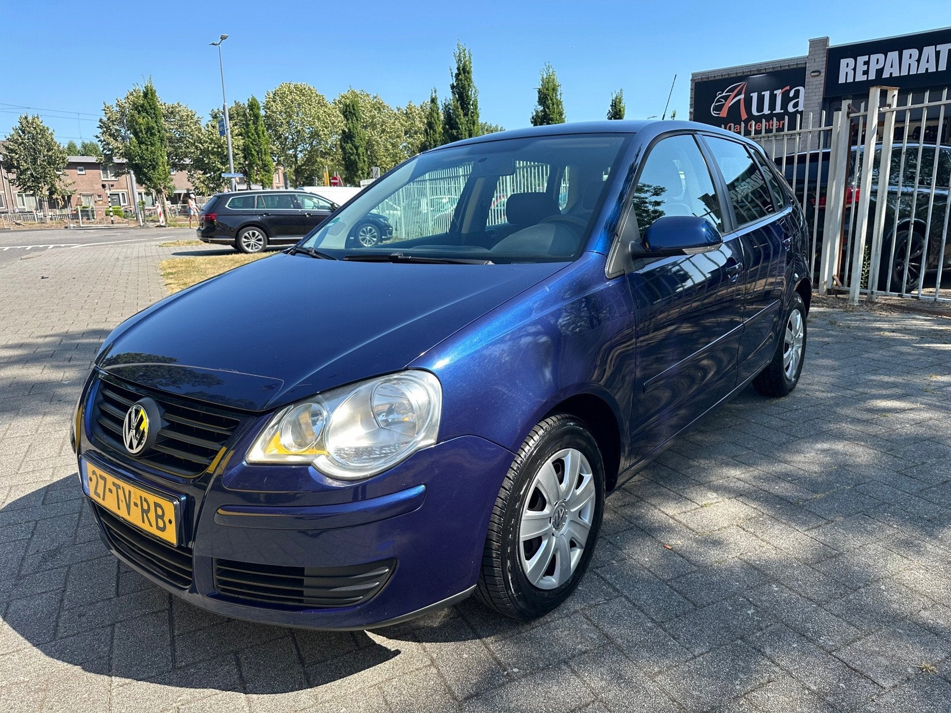 Volkswagen Polo 1.4-16V Optive, Auto's, Voorwielaandrijving, Gebruikt, 4 cilinders, Blauw