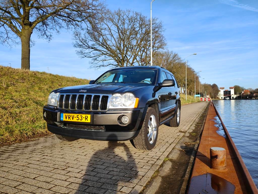 Te koop jeep Grand Cherokee grijs kenteken, Auto's, Bestelauto's, Bruin, 3360 kg, 2146 kg, Te koop