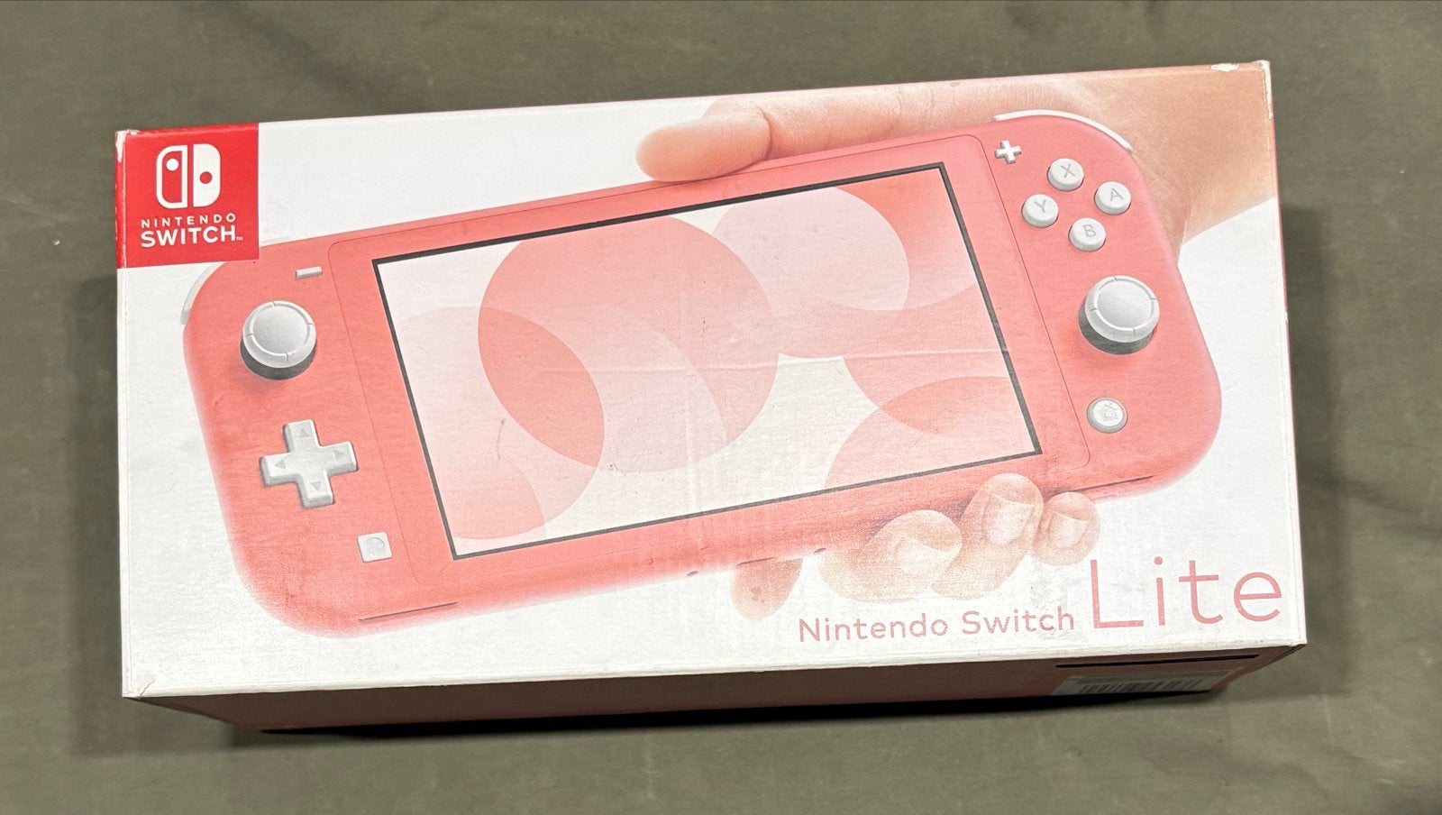 Nintendo Switch Lite Roze - In uitstekende conditie, Ophalen of Verzenden, Roze of Coral, Zo goed als nieuw