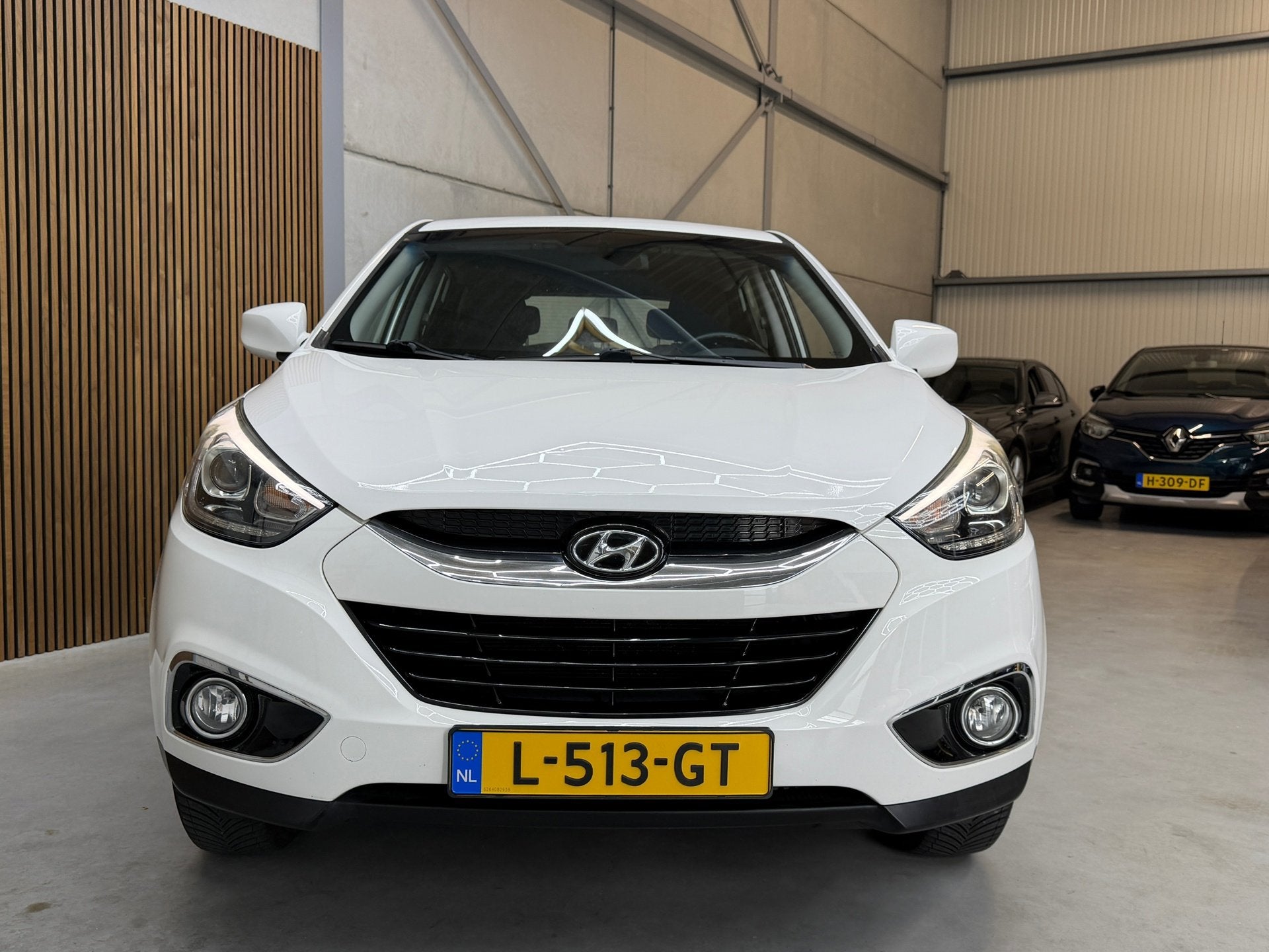 Hyundai Ix35 2.0i i-Motion AUTOMAAT, Auto's, Hyundai, Euro 5, Stof, Gebruikt, Zwart