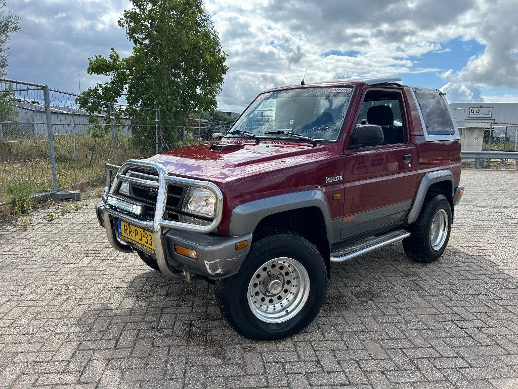 Daihatsu Feroza 1.6 I Resintop 4WD 1997 Rood, Feroza, Stof, 1590 cc, Origineel Nederlands